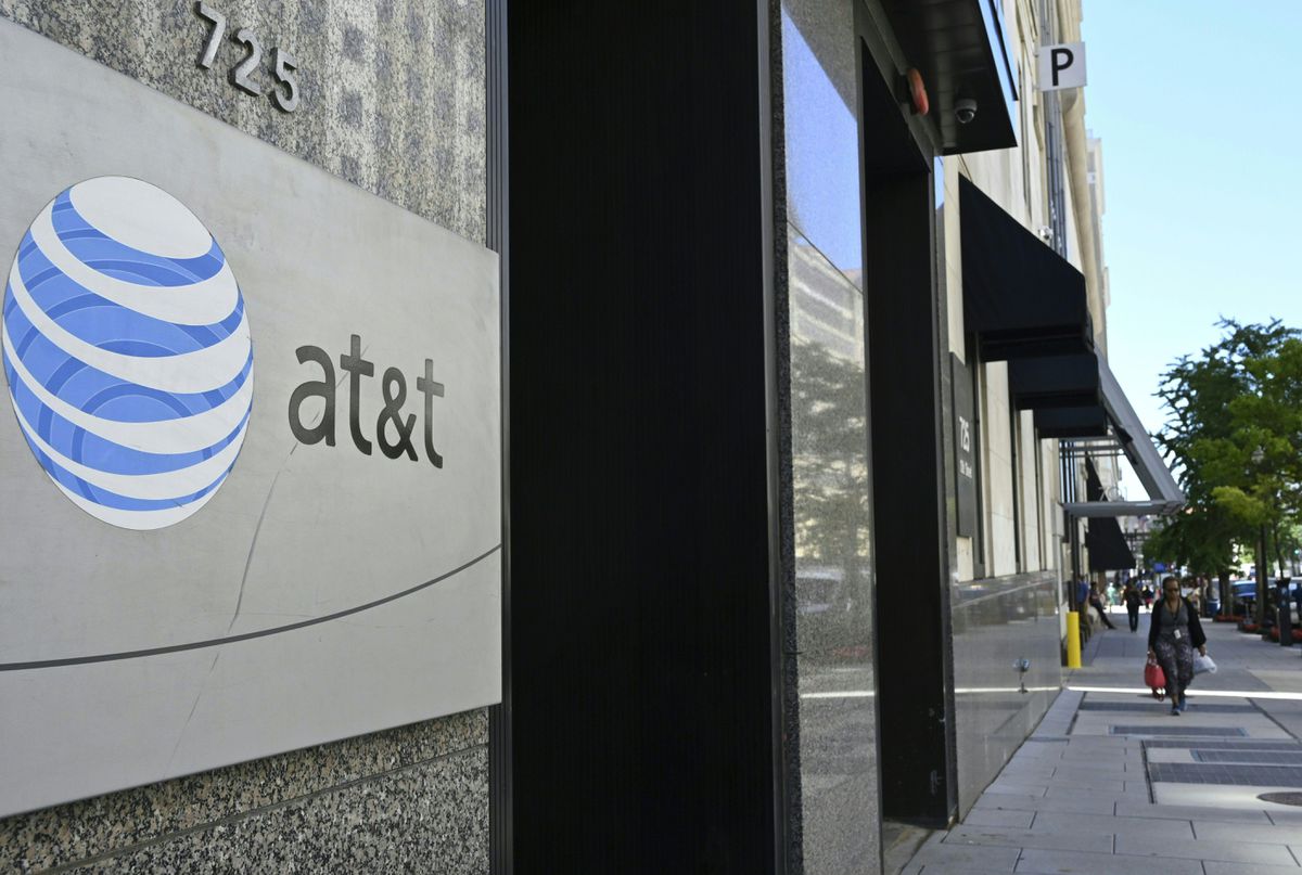 Image for AT&T Reaches Deal With Activist Investor To Sell Assets And Restructure Management [telecom] 