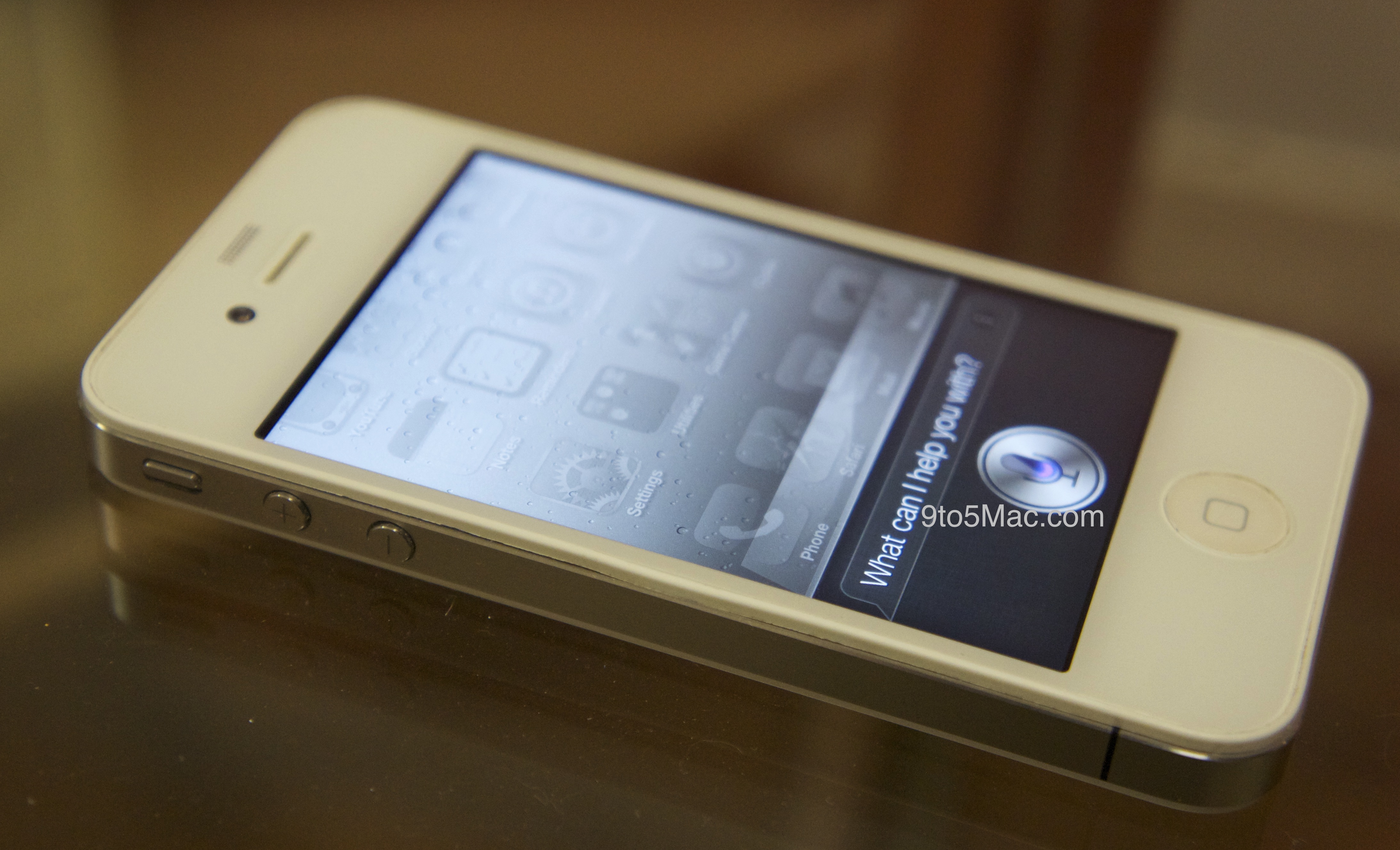 Image for Siri voice command system ported from iPhone 4S to iPhone 4  (video)  [telecom]