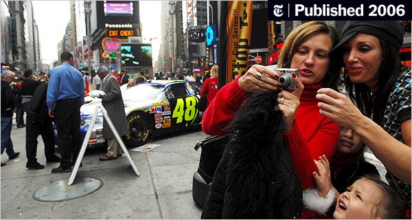 Image for Times Sq. Ads Spread Via Tourists' Cameras